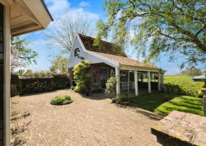 Idyllisch en knus huisje met prachtige veranda.